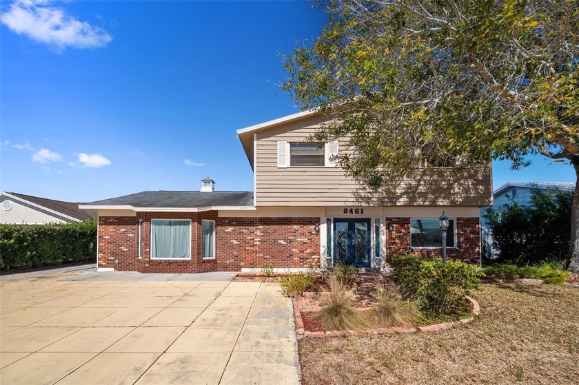 Welcome to this waterfront 4-bedroom, 3-bath pool home in Bay - Beach Home for sale in Tampa, Florida on Beachhouse.com