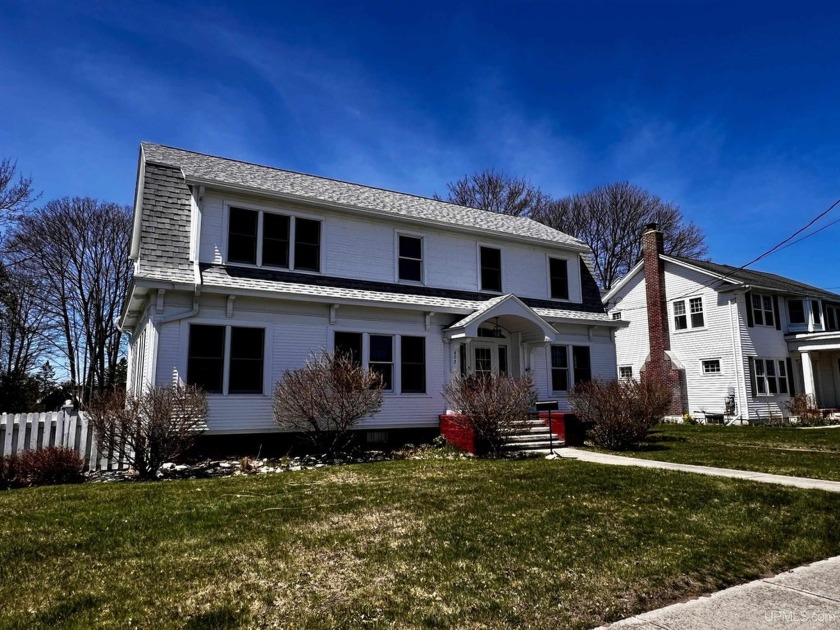 Welcome to this stunning historic property just steps from the - Beach Home for sale in Manistique, Michigan on Beachhouse.com