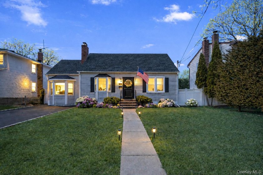 Welcome to this charming, updated Cape Cod nestled in the - Beach Home for sale in Massapequa Park, New York on Beachhouse.com