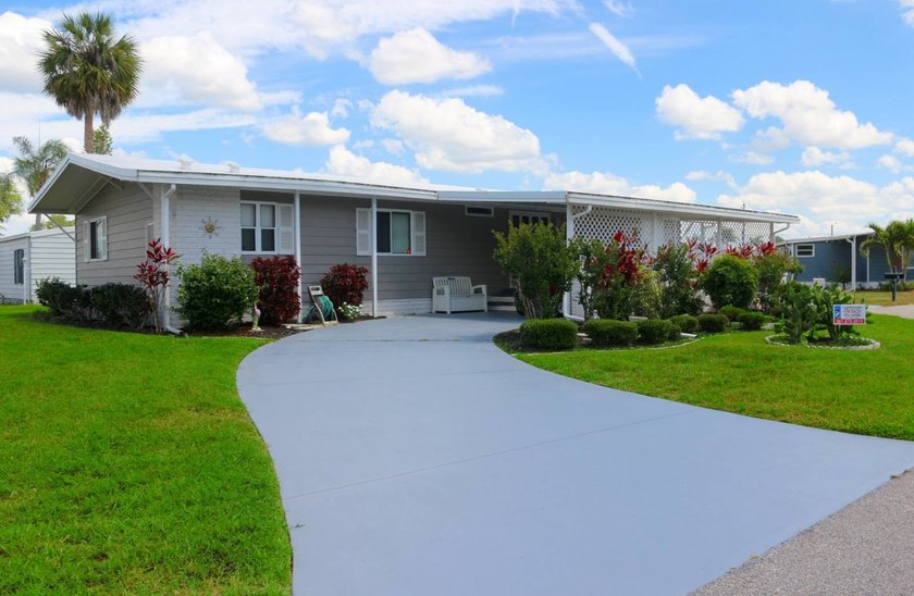 Location, location, location and curb appeal, this home has them - Beach Home for sale in Sarasota, Florida on Beachhouse.com
