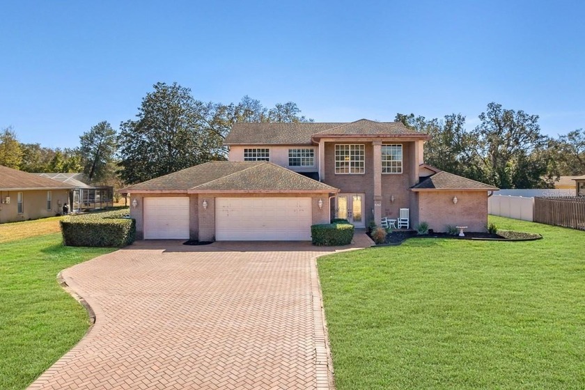 THIS HOME IS A MUST-SEE!  Welcome to Sutton Place, one of Spring - Beach Home for sale in Spring Hill, Florida on Beachhouse.com