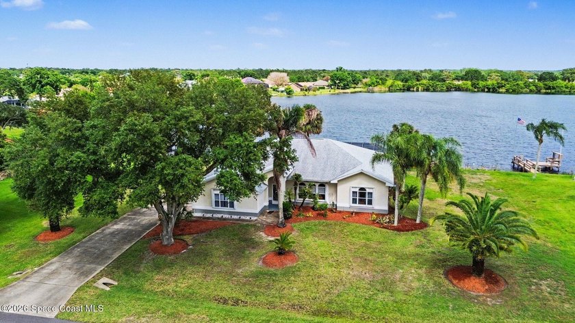 Welcome Home! Wake up to stunning lakefront sunrises from this - Beach Home for sale in Palm Bay, Florida on Beachhouse.com
