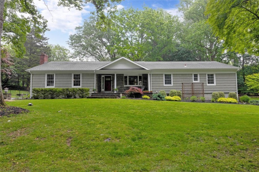 Nestled in the charming historic village of Nissequogue, this - Beach Home for sale in Nissequogue, New York on Beachhouse.com