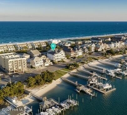 Perched along the shimmering shores of Banks Channel with its - Beach Home for sale in Wrightsville Beach, North Carolina on Beachhouse.com