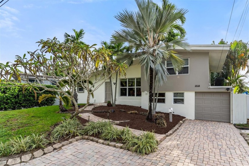 Welcome to this charming tri-level mid-century home in the - Beach Home for sale in Fort Lauderdale, Florida on Beachhouse.com