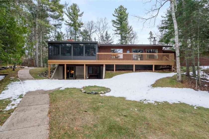 Nestled along the stunning shores of Lake Michigan in Charlevoix - Beach Home for sale in Charlevoix, Michigan on Beachhouse.com