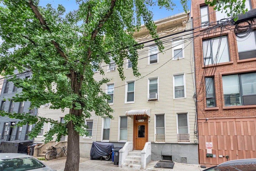 Nestled on a picturesque, tree-lined street in the heart of Long - Beach Townhome/Townhouse for sale in Long Island City, New York on Beachhouse.com