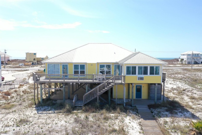 Enjoy stunning waterfront views from this 3-bedroom, 2-bathroom - Beach Home for sale in Gulf Shores, Alabama on Beachhouse.com