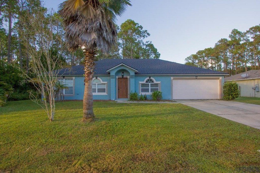 MOTIVATED SELLERS - BRING US AN OFFER!  Very spacious 4 BEDROOM - Beach Home for sale in Palm Coast, Florida on Beachhouse.com