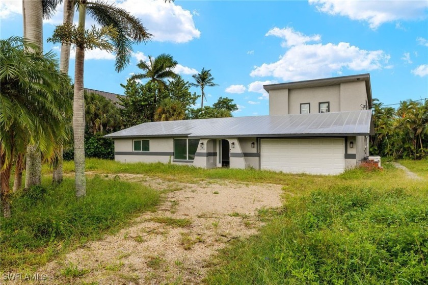 Welcome to 3784 Coquina Dr, a beautifully updated ground-level - Beach Home for sale in Sanibel, Florida on Beachhouse.com