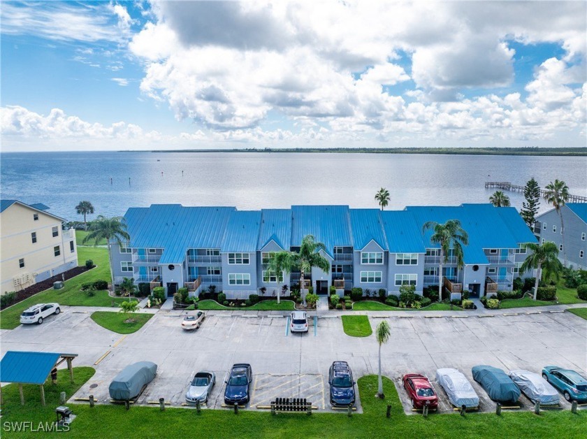 Experience the serenity of waterfront living in this beautifully - Beach Condo for sale in Port Charlotte, Florida on Beachhouse.com