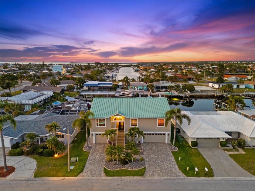 Step into your dream home! This flawlessly updated 4-bedroom - Beach Home for sale in New Port Richey, Florida on Beachhouse.com