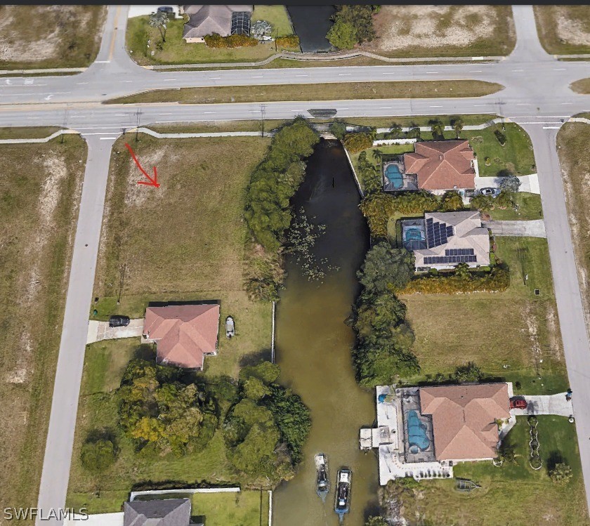 Beautiful OVERSIZED CORNER LOT on FRESH WATER canal. Build your - Beach Lot for sale in Cape Coral, Florida on Beachhouse.com