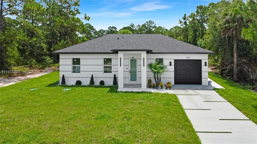 Beautifully upgraded 3-bedroom, 3-bath home offering modern - Beach Home for sale in Lehigh Acres, Florida on Beachhouse.com