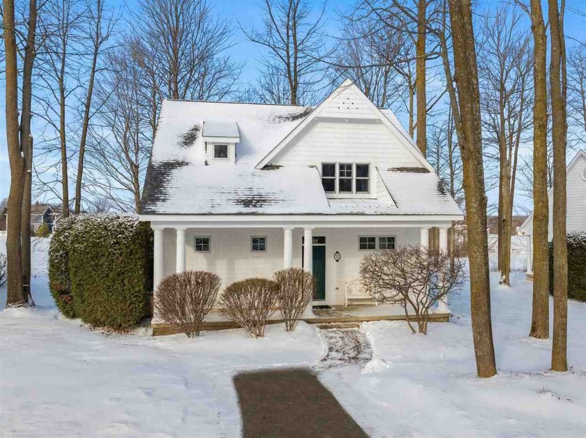 Offering Lake Michigan views, this fully furnished charming - Beach Home for sale in Petoskey, Michigan on Beachhouse.com