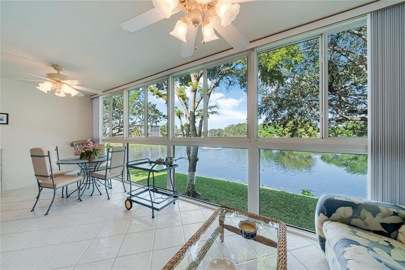 Enjoy serene lake views from this spacious 2-bedroom, 1.5-bath - Beach Condo for sale in Deerfield Beach, Florida on Beachhouse.com