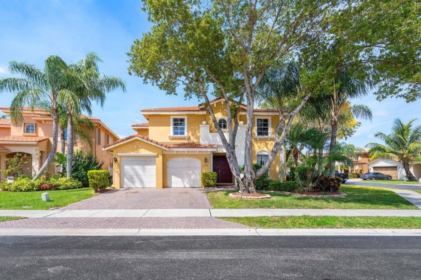 This tastefully updated home sits on a large corner lot in the - Beach Home for sale in West Palm Beach, Florida on Beachhouse.com