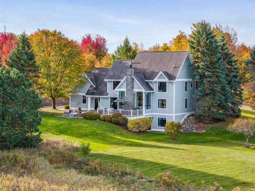 Welcome to this exquisite 4 bedroom, 4 bath home nestled in the - Beach Home for sale in Petoskey, Michigan on Beachhouse.com