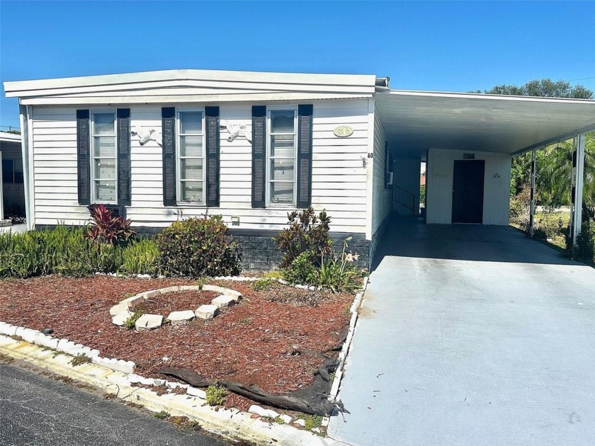 Nice curb appeal 2bed/2bath winter home, located on private - Beach Home for sale in Pinellas Park, Florida on Beachhouse.com