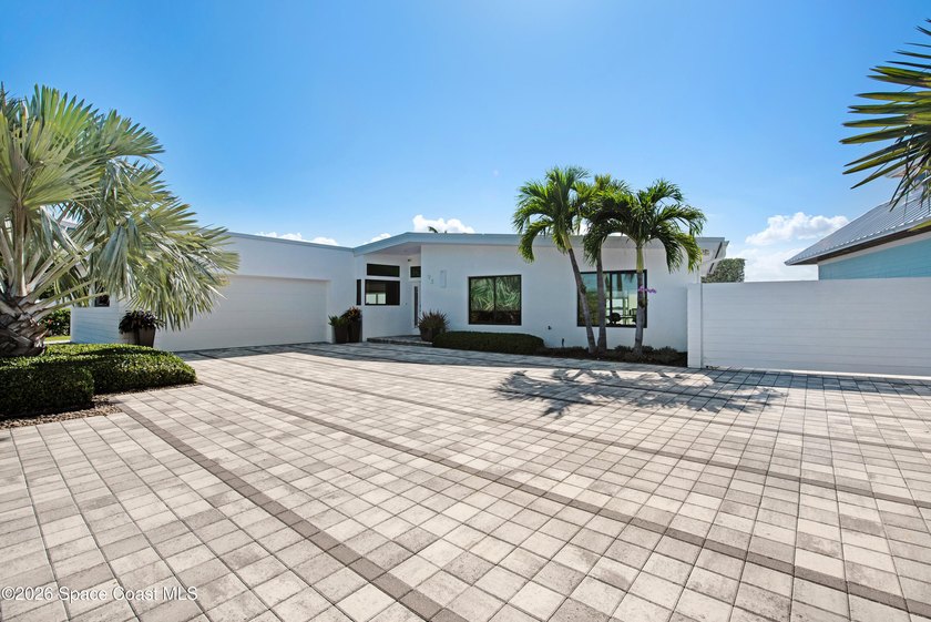 A rare waterfront offering in the exclusive Snug Harbor enclave - Beach Home for sale in Cocoa Beach, Florida on Beachhouse.com