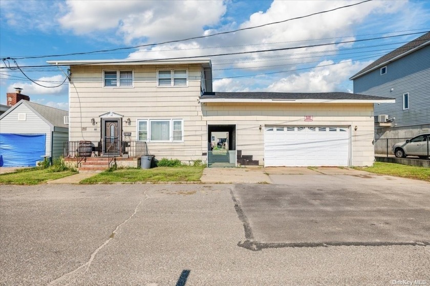 Waterfront Colonial is on desirable Venetian Shores with views - Beach Home for sale in Lindenhurst, New York on Beachhouse.com