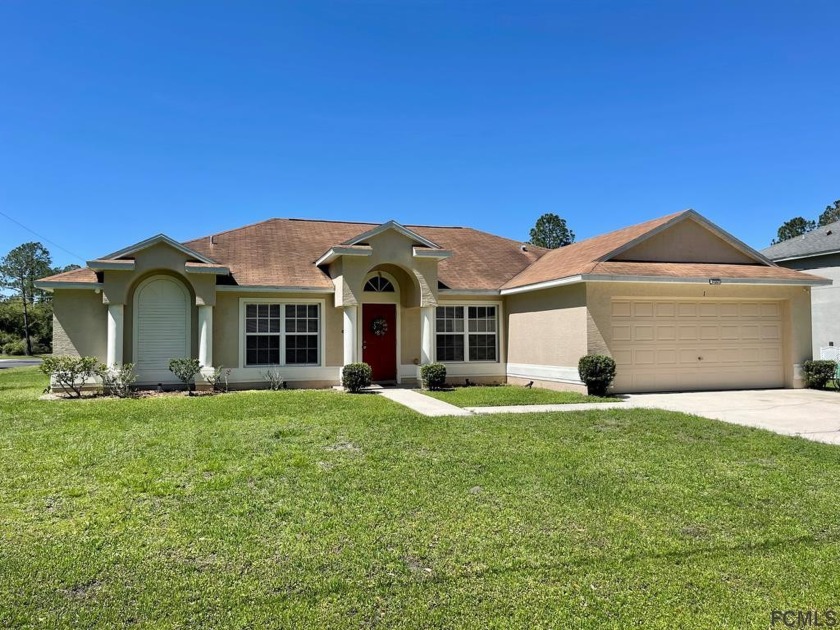 Investor Alert! Large corner lot highlights this beautiful 4/2/2 - Beach Home for sale in Palm Coast, Florida on Beachhouse.com
