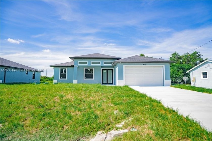 Welcome to this gorgeous brand-new construction home! Featuring - Beach Home for sale in Lehigh Acres, Florida on Beachhouse.com
