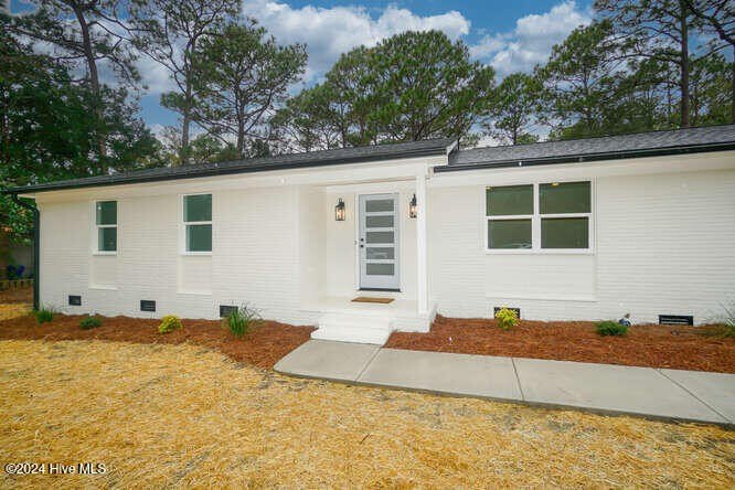 This beautifully renovated single-story home offers a modern - Beach Home for sale in Southport, North Carolina on Beachhouse.com