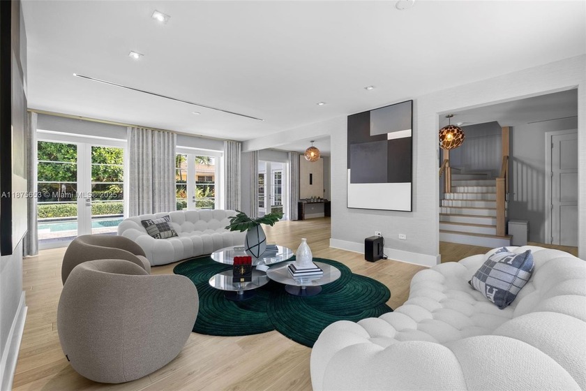 This luxurious Miami Beach estate presents a seamless blend of - Beach Home for sale in Miami Beach, Florida on Beachhouse.com