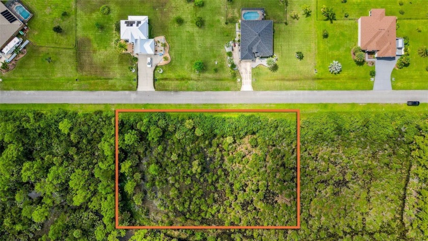 Build your dream oasis on this rare lake-view lot in the highly - Beach Lot for sale in Grant Valkaria, Florida on Beachhouse.com