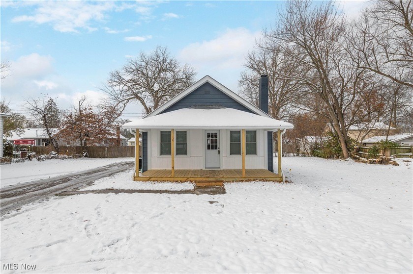 Discover this updated cottage just steps from the lake and close - Beach Home for sale in Vermilion, Ohio on Beachhouse.com