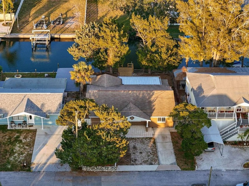 Just Reduced! This charming 3-bedroom, 2-bathroom waterfront - Beach Home for sale in Hudson, Florida on Beachhouse.com