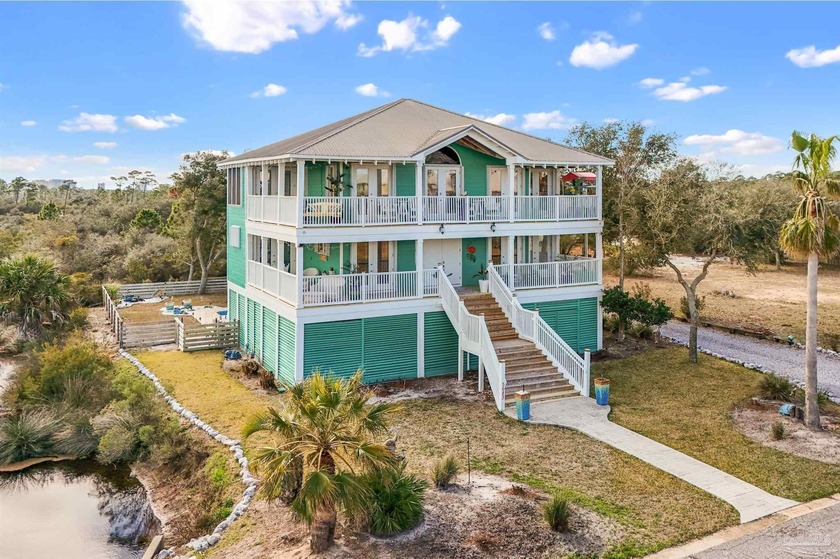 Nestled against the picturesque backdrop of Big Lagoon State - Beach Home for sale in Pensacola, Florida on Beachhouse.com