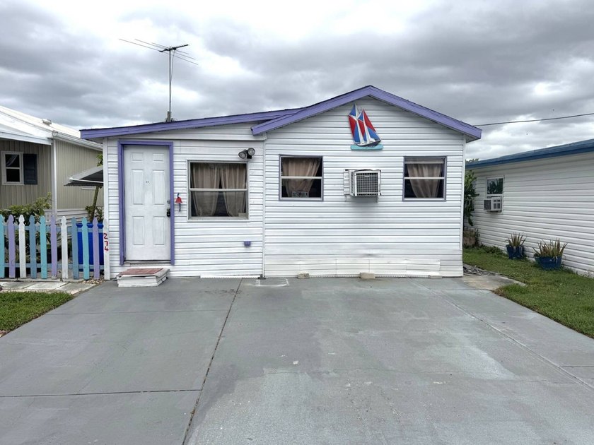 This Spacious 2 Bedroom, 1 Bath Home is located in Holiday - Beach Home for sale in Holiday, Florida on Beachhouse.com