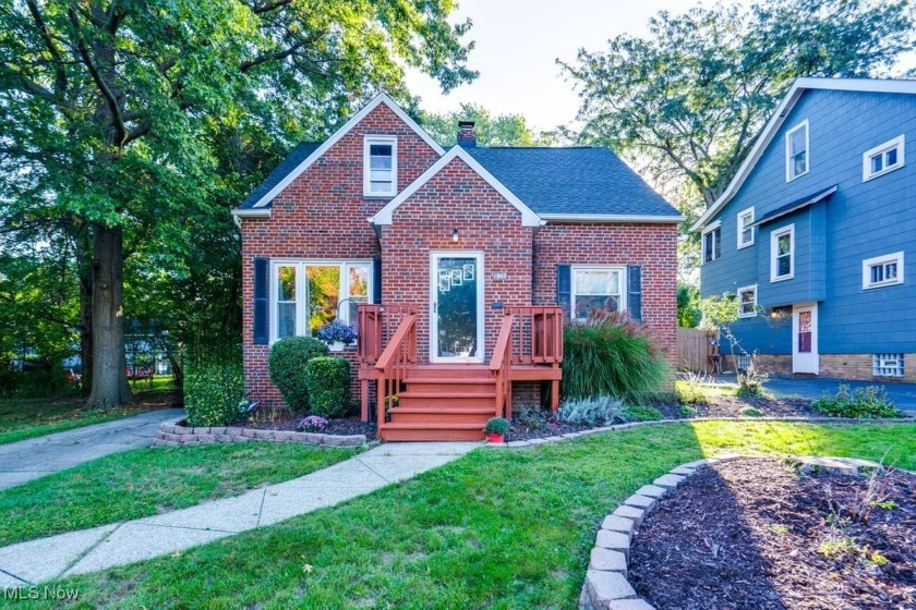 Discover your dream home in this charming brick bungalow - Beach Home for sale in Euclid, Ohio on Beachhouse.com