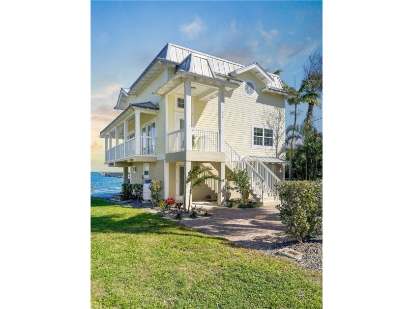 Riverfront masterpiece. Coastal opulence. Perched on serene - Beach Home for sale in Sebastian, Florida on Beachhouse.com