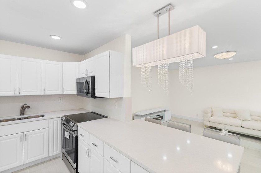 This beautifully remodeled corner unit offers stunning canal and - Beach Condo for sale in Delray Beach, Florida on Beachhouse.com