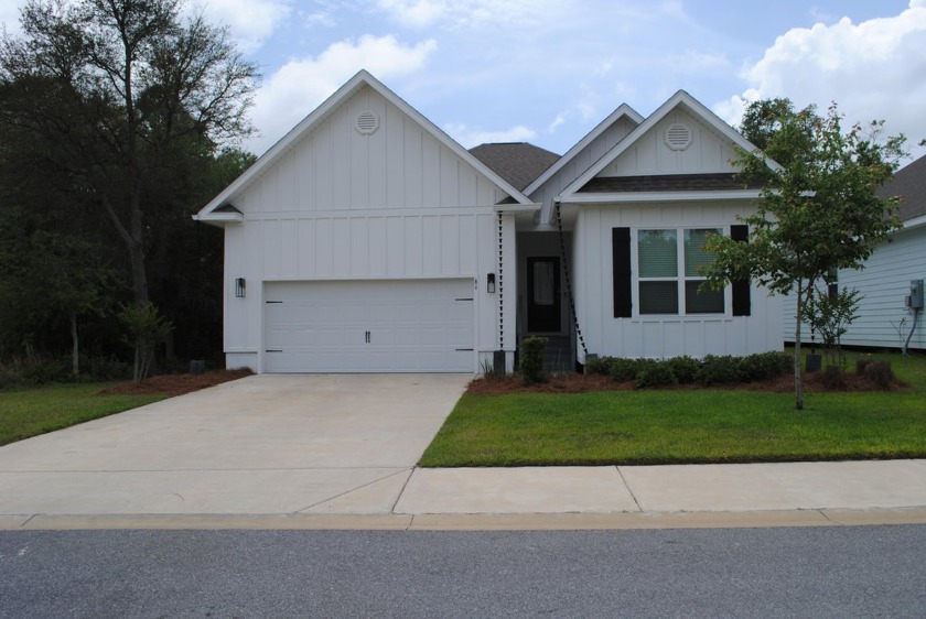 Just minutes from the sparkling Gulf of America, this spacious - Beach Home for sale in Santa Rosa Beach, Florida on Beachhouse.com