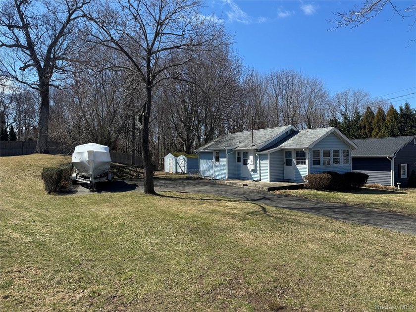 Get ready for Summer! This cozy two bedroom home is just a 10 - Beach Home for sale in Miller Place, New York on Beachhouse.com