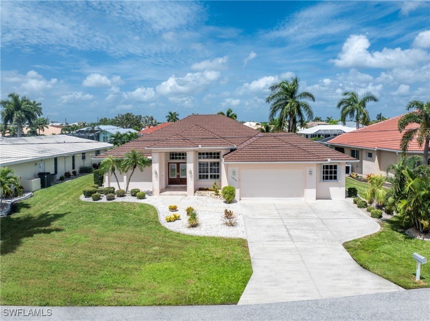 Waterfront pool home in Punta Gorda Isles with an ideal location - Beach Home for sale in Punta Gorda, Florida on Beachhouse.com