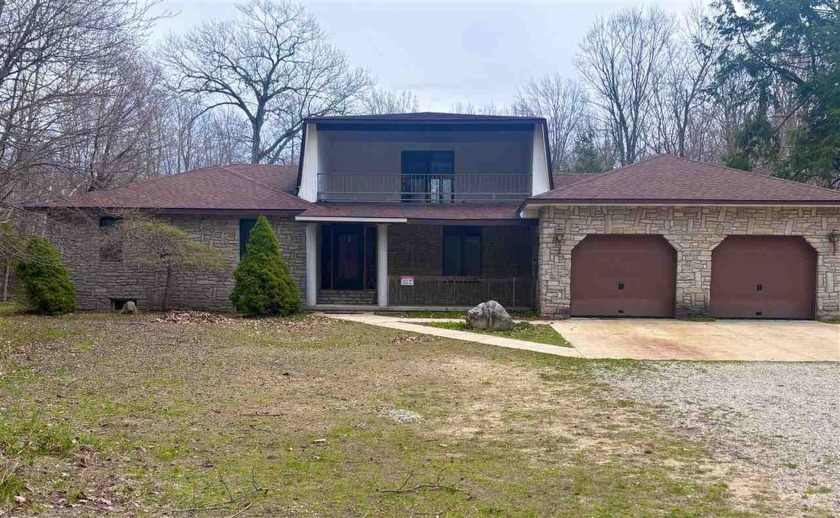 Nestled along the iconic Tunnel of Trees, just 1.5 miles south - Beach Home for sale in Harbor Springs, Michigan on Beachhouse.com
