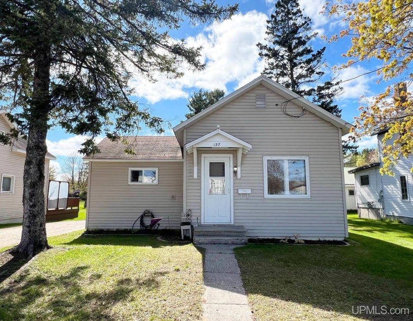 Located on Manistique's West Side, this charming ranch style - Beach Home for sale in Manistique, Michigan on Beachhouse.com