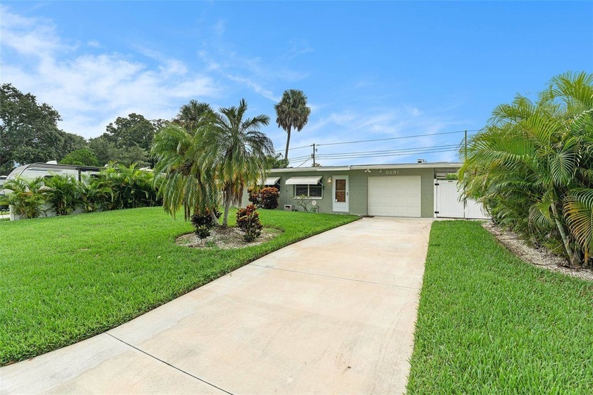 Welcome Home to this inviting 3-bedroom, 1-bath home nestled in - Beach Home for sale in Seminole, Florida on Beachhouse.com