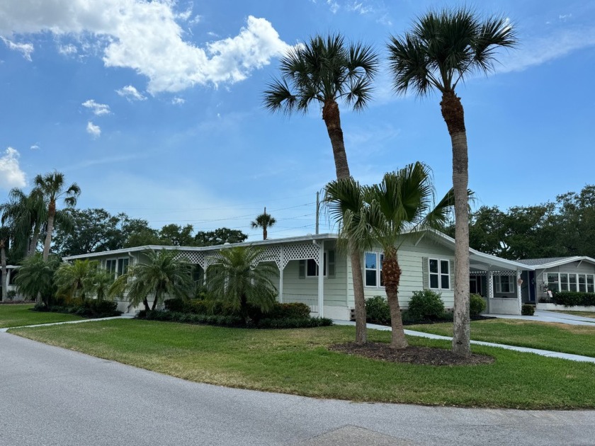 THIS HOME IS ON LEASED LAND WITH AN APPROXIMATE MONTHLY LOT - Beach Home for sale in Sarasota, Florida on Beachhouse.com