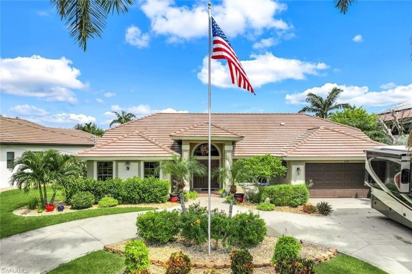 Immerse yourself in this exquisite 4-Bedroom Waterfront Home in - Beach Home for sale in Cape Coral, Florida on Beachhouse.com