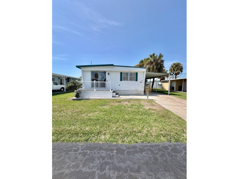 Welcome to this furnished 2-bedroom, 2-bath home located in the - Beach Home for sale in Palmetto, Florida on Beachhouse.com