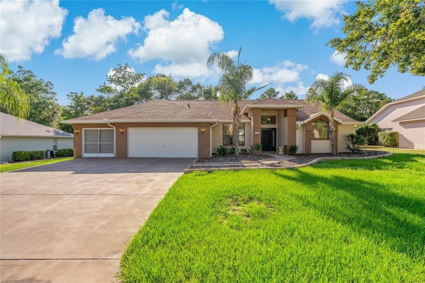 This Gorgeous POOL Home located in the Golf Community of Sugar - Beach Home for sale in Homosassa, Florida on Beachhouse.com