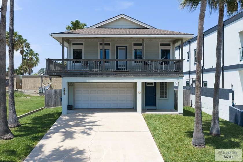 Tucked near the bay, this charming 2-bedroom, 2.5-bath coastal - Beach Home for sale in South Padre Island, Texas on Beachhouse.com