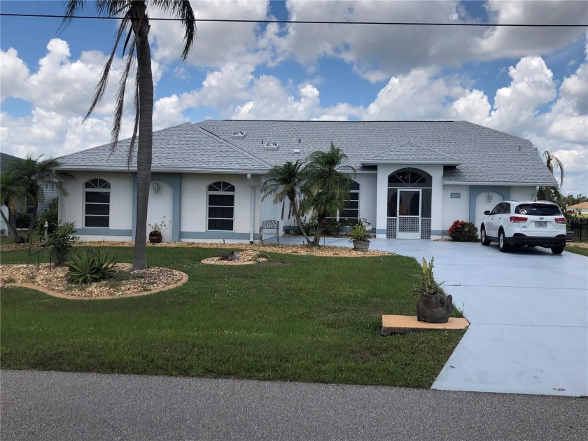 Impressive LAKE FRONT 3 Bedroom, 2.5 Bathroom home with attached - Beach Home for sale in Punta Gorda, Florida on Beachhouse.com