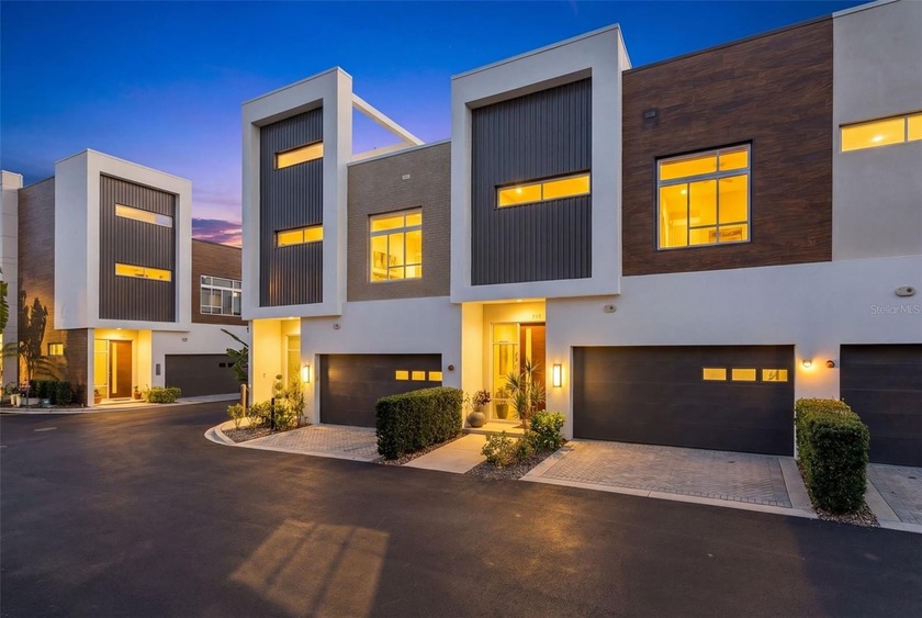 Discover contemporary luxury at its finest in this impeccably - Beach Townhome/Townhouse for sale in Sarasota, Florida on Beachhouse.com